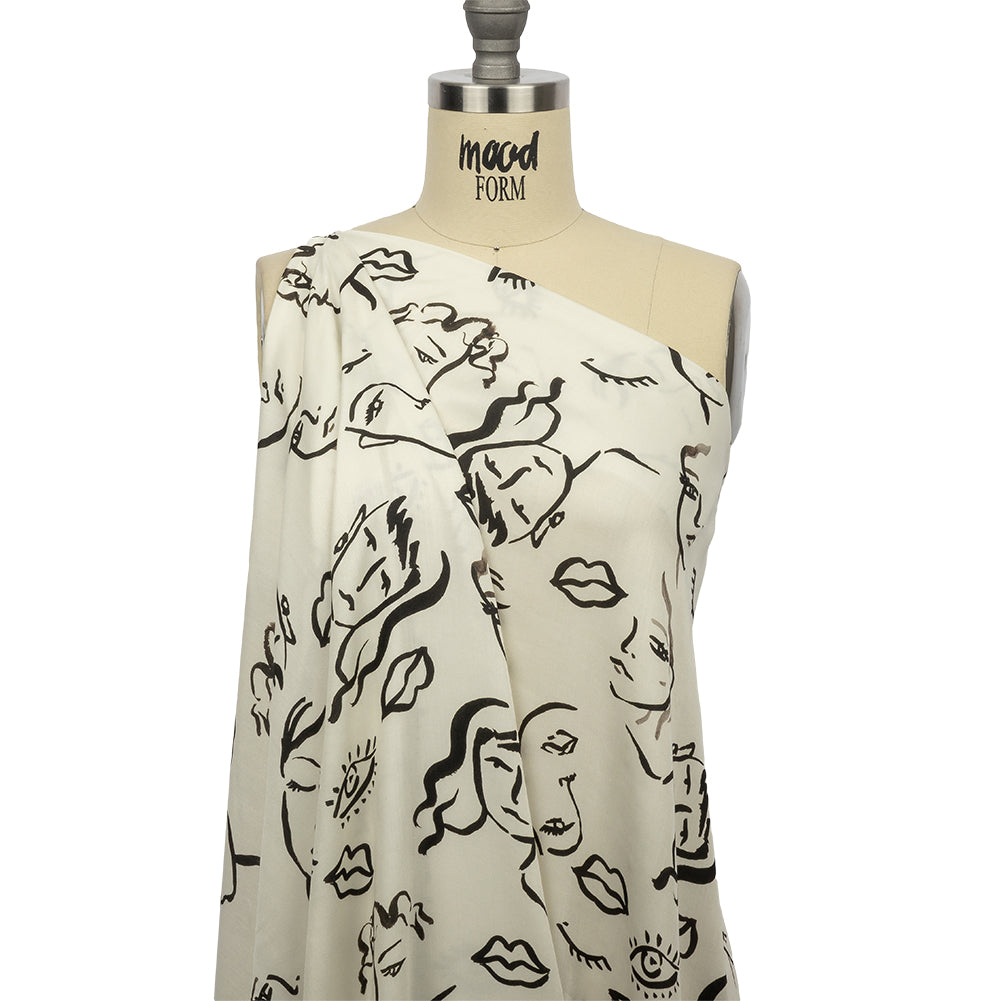 Rayon Challis - Black and White Face Drawings - Everyday Runway Print - Mood Exclusive Metro Collection - Joann Fabrics