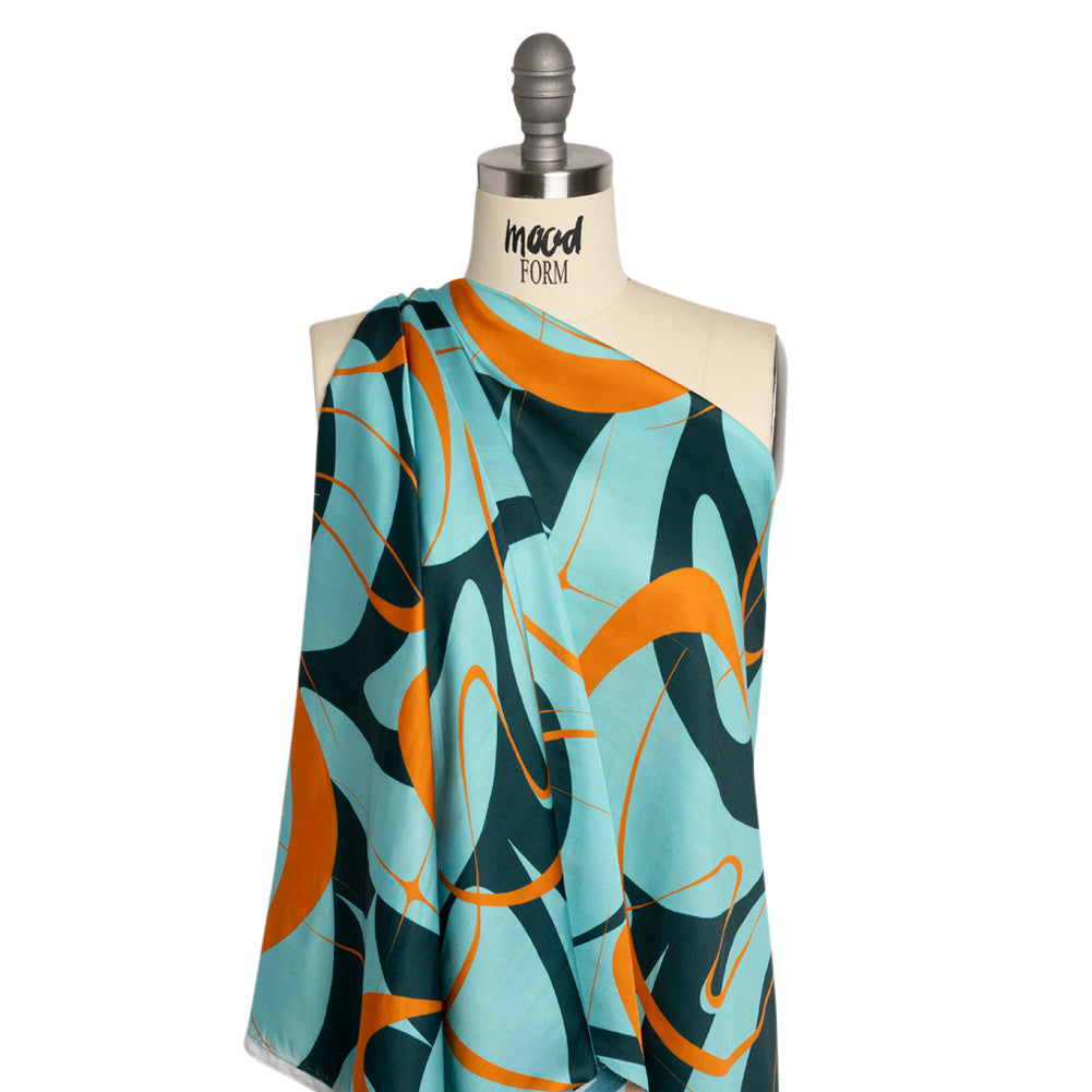 Sustainable and Recycled Viscose Satin Print - Turquoise and Orange Swirling Abstract - Mood Exclusive Atmospheric Adventure - Joann Fabrics