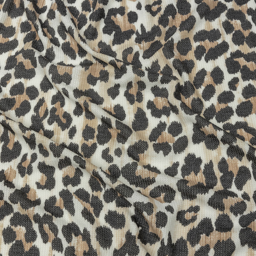 Black, Tan and White Leopard Spots Polyester and Rayon Waffle Knit - Joann Fabrics