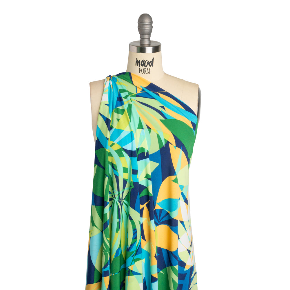 Stretch Polyester Tricot - Green, Blue and Goldenrod Overlapping Palm Leaves - Designer Deadstock - Joann Fabrics