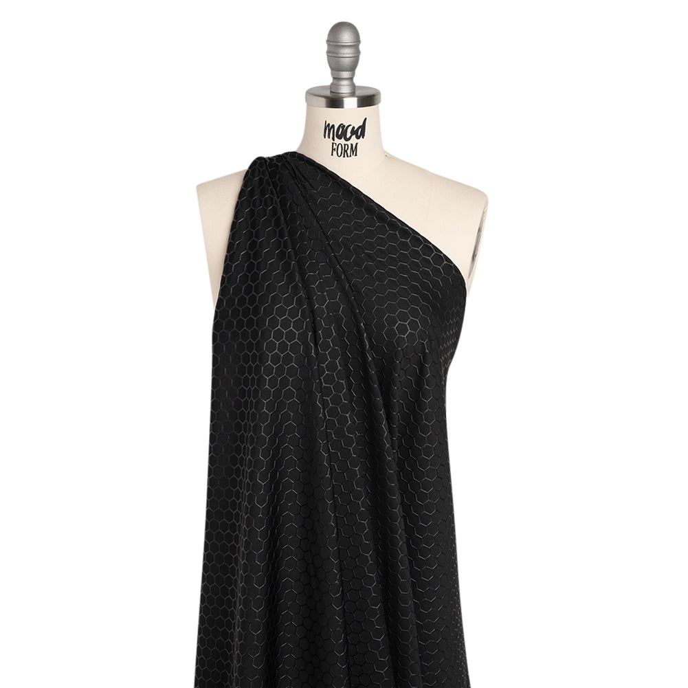 Yaya Han Stretch Polyester Interlock Knit with Puff Print - Black Honeycomb Hexagons - Cosplay Collection - Joann Fabrics