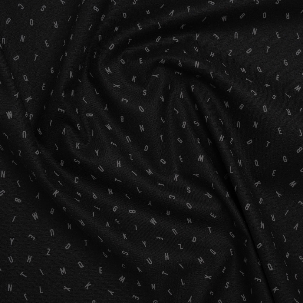 Printed Quilting Cotton by Ghazal Razavi for FIGO Studio - Black and Gray Jumbled Letters - Dusk Collection - Joann Fabrics
