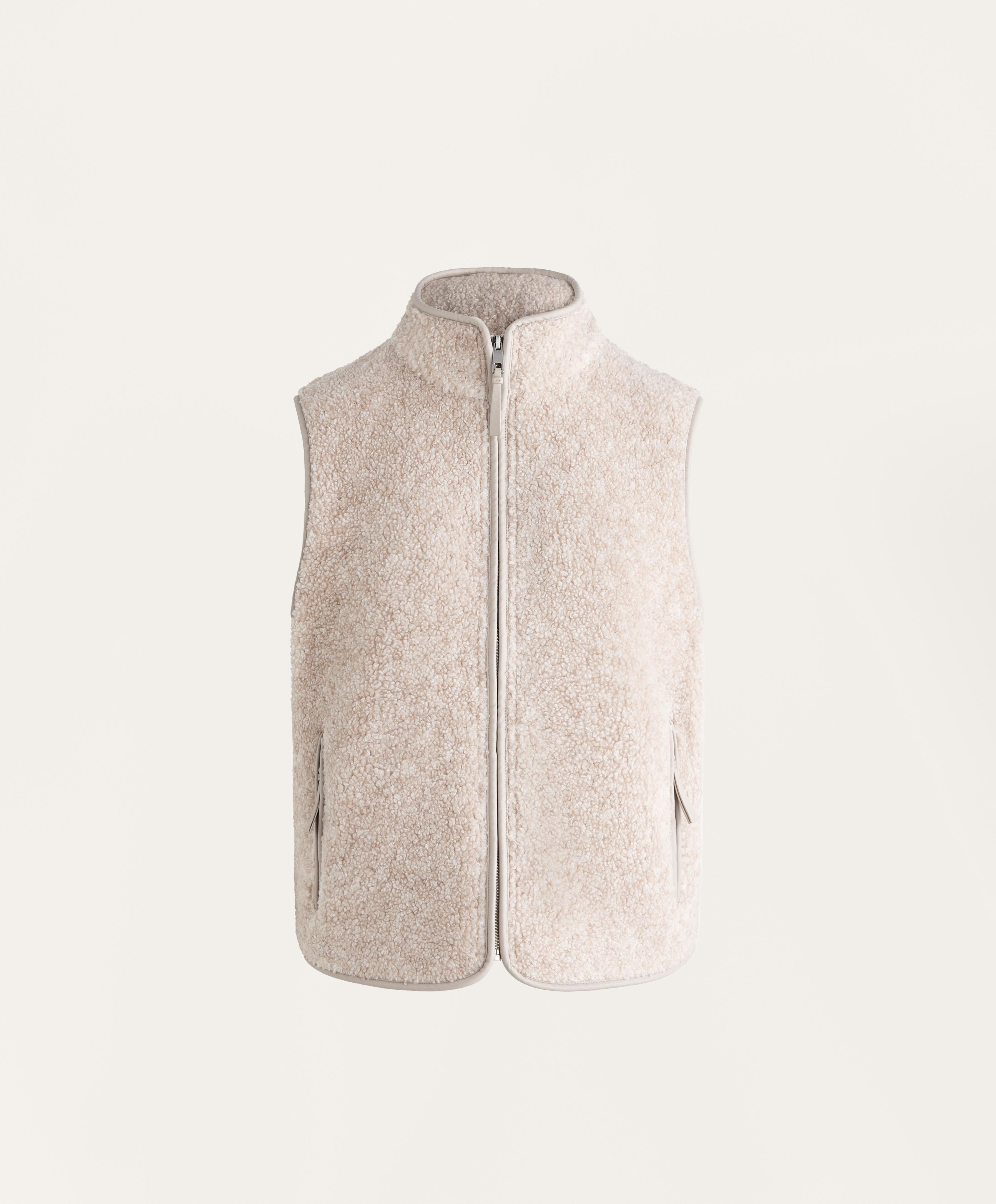 Basic faux-shearling zip-up gilet.