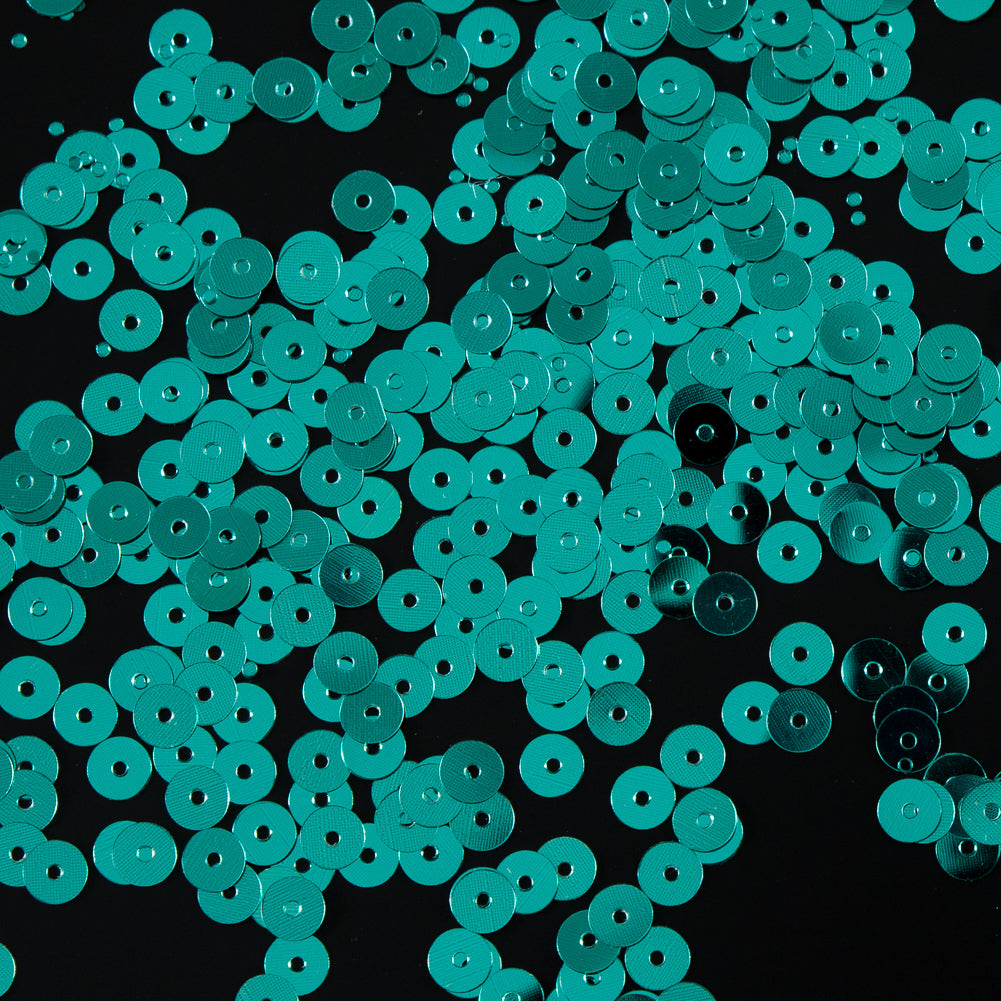 Bag of Teal Color Loose Sequins with Silver Back - 5mm - Joann Fabrics