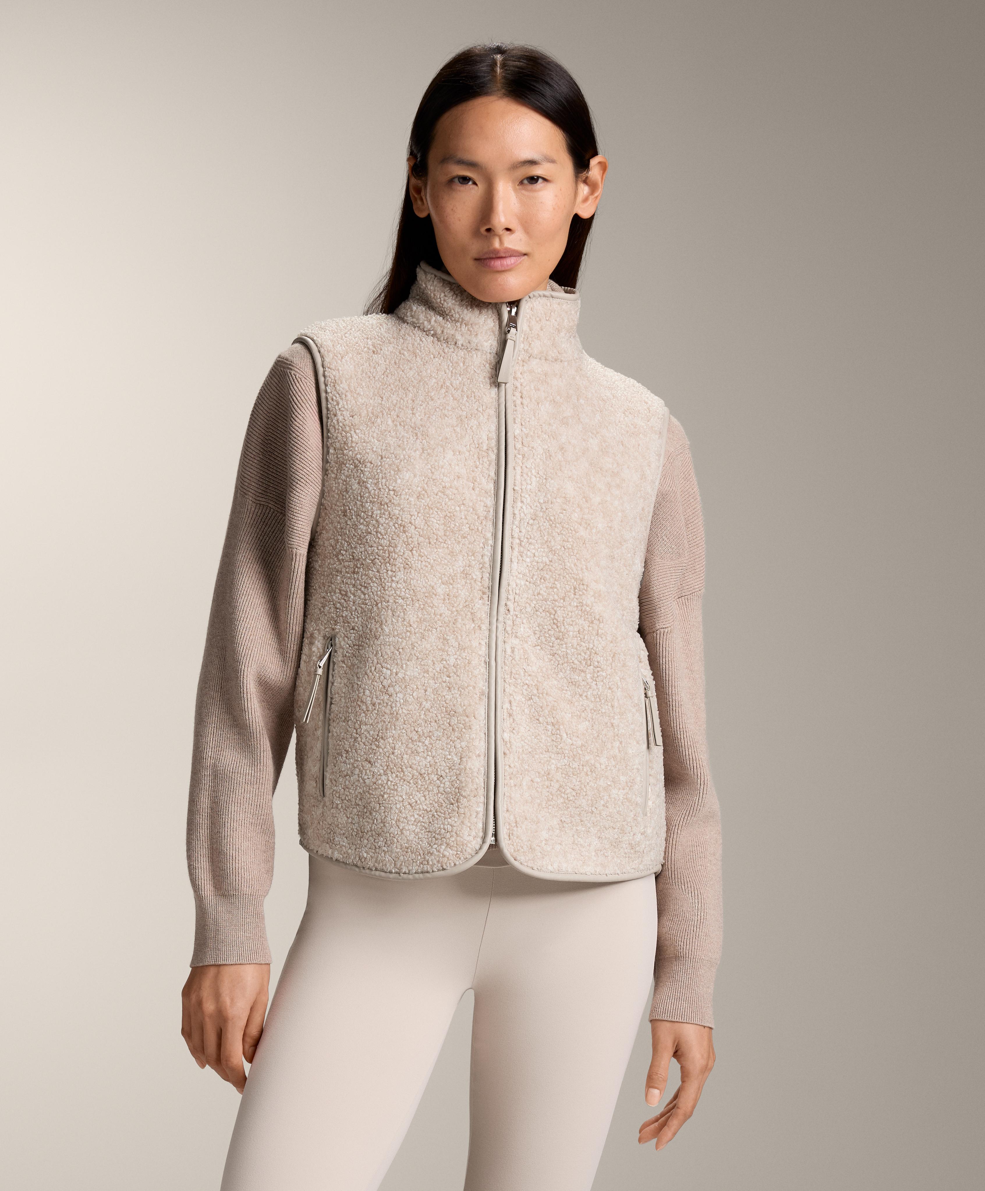 Basic faux-shearling zip-up gilet.