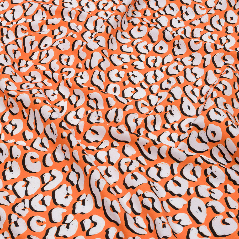 Recycled Polyester Swim Trunk Fabric - Orange and White Animal Spots - Dune Surfing Print - Mood Exclusive Malibu Collection - Joann Fabrics