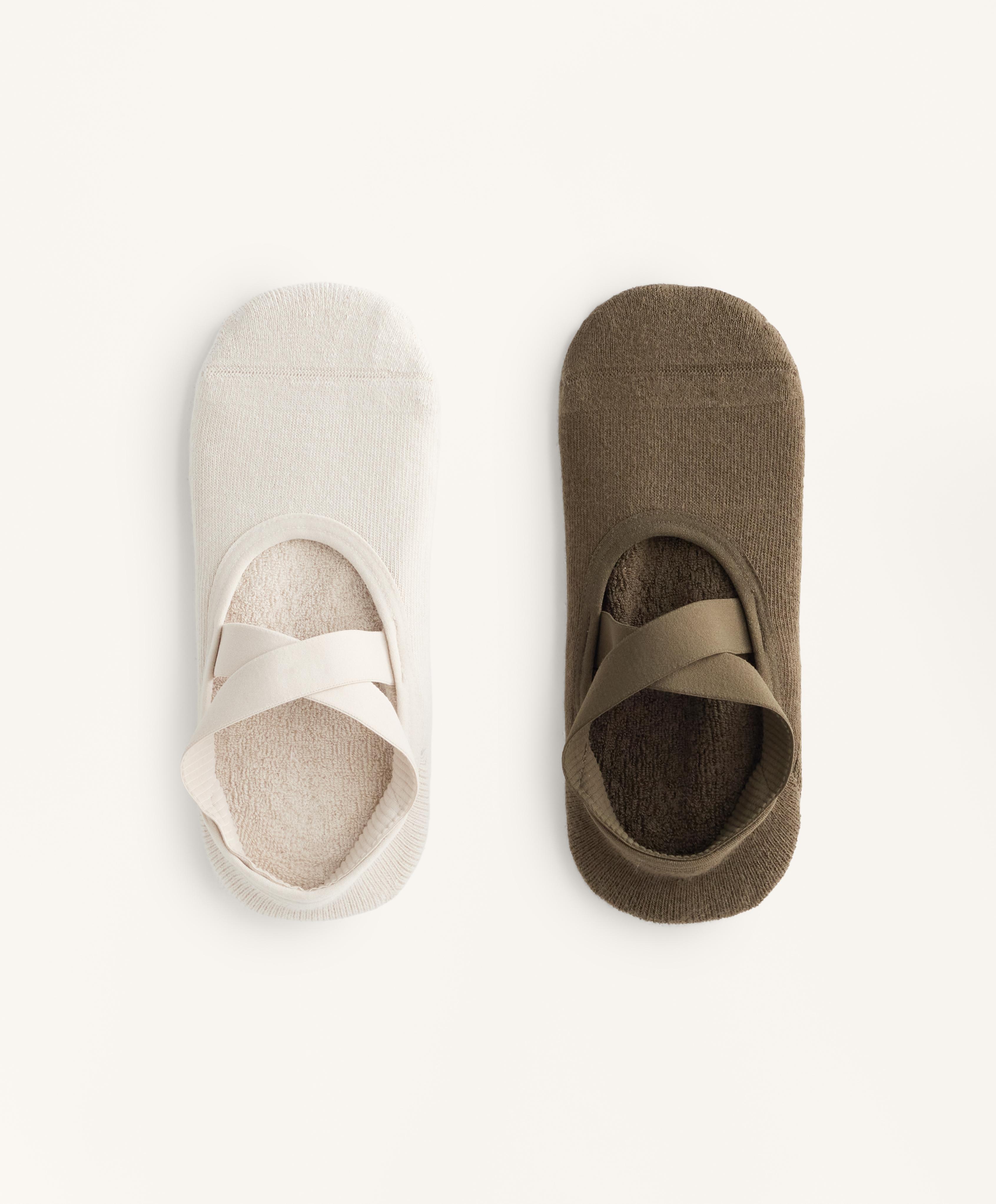 2 pairs of cotton blend yoga and Pilates socks with crossover straps