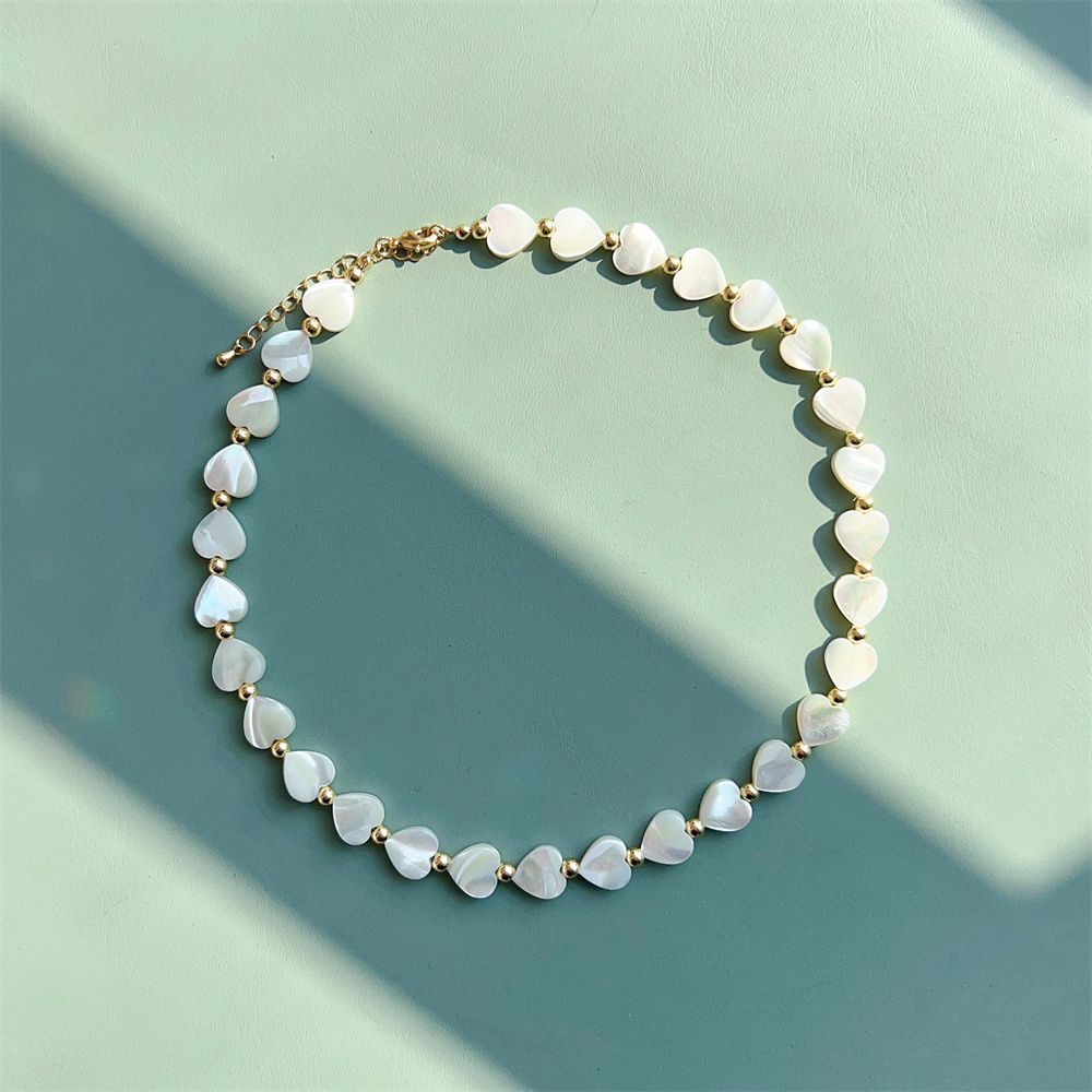 Add a touch of luxury to your jewelry collection with our Natural Shell Star Heart Choker Necklace - the perfect gift for women! - Grocery