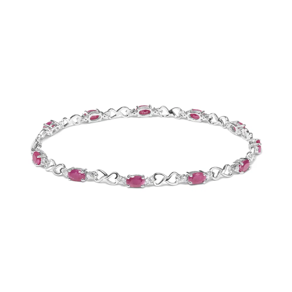 .925 Sterling Silver Pink Oval Shaped Ruby and 1/4 Cttw Diamond 7.25