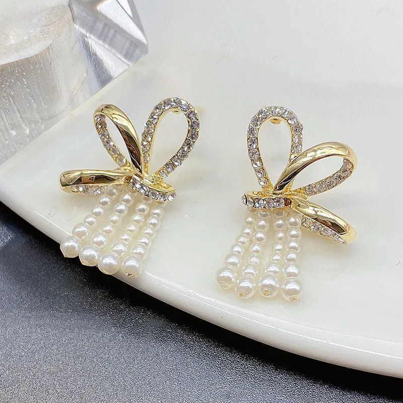 S925 Silver Needle Sweet Temperament Exaggerated Bow Rice Bead Tassel Earrings - Grocery