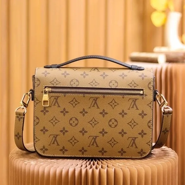 LV Monogram Leather Courier Bag