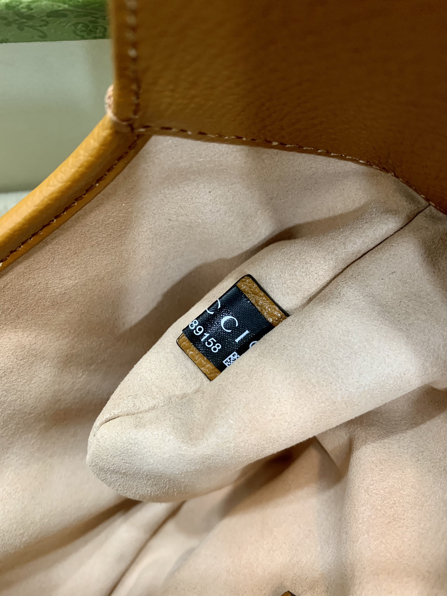 Chip-Embedded Aphrodite Small Handbag