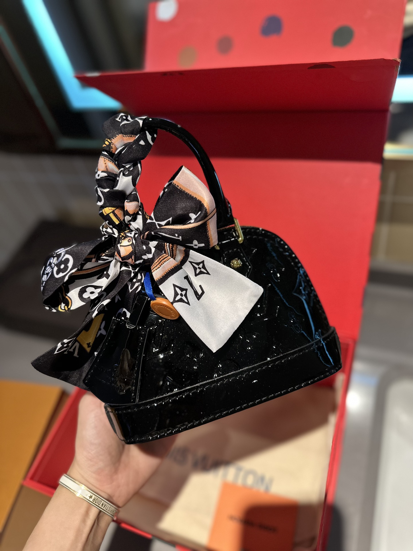 LV Alma Leather Shell Bag