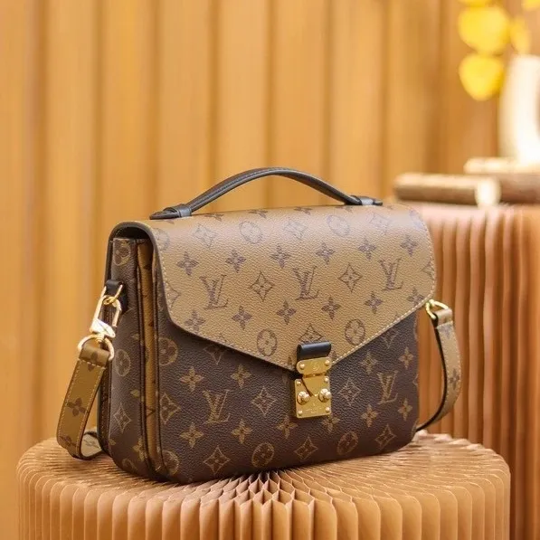 LV Monogram Leather Courier Bag