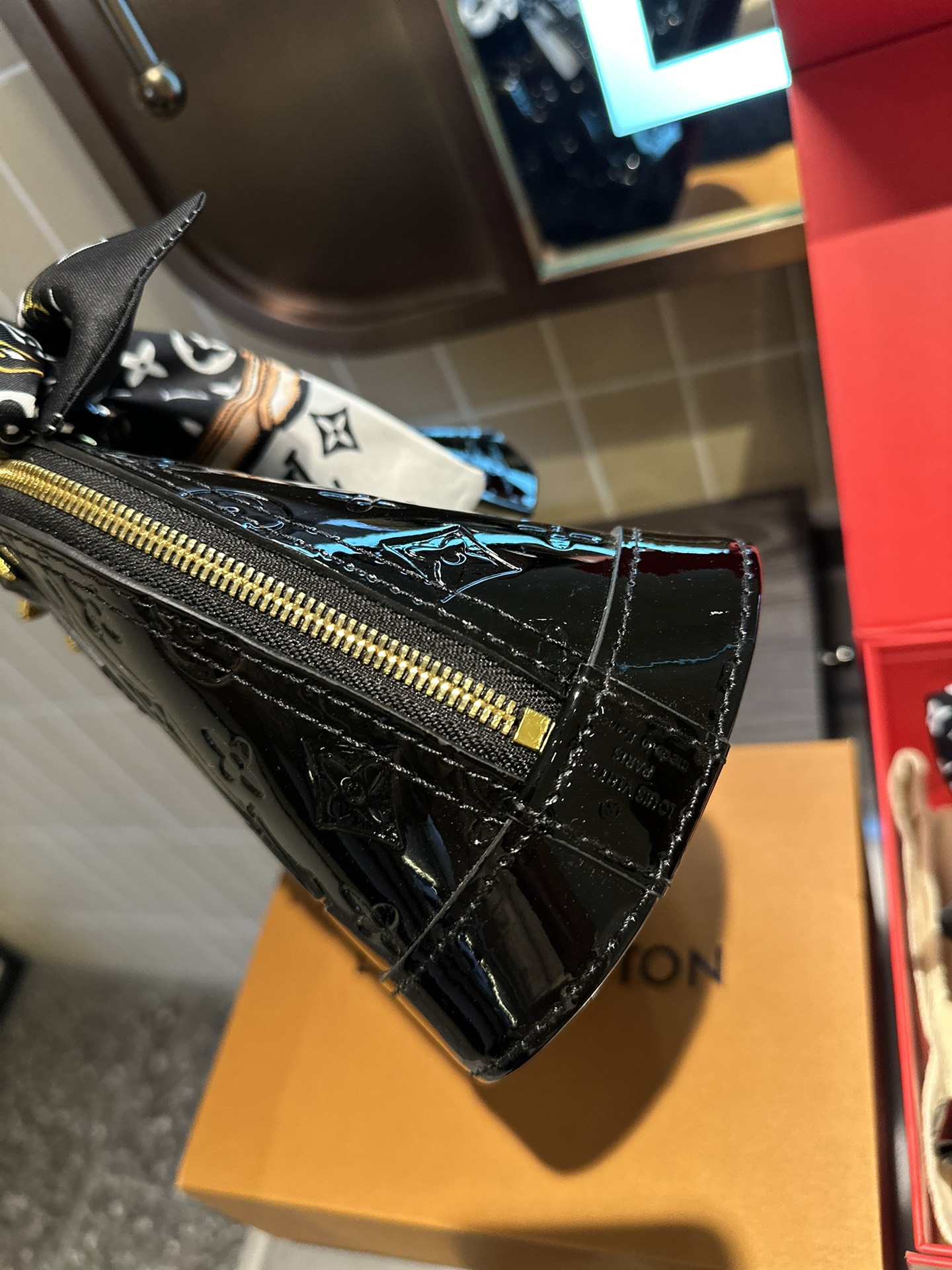 LV Alma Leather Shell Bag