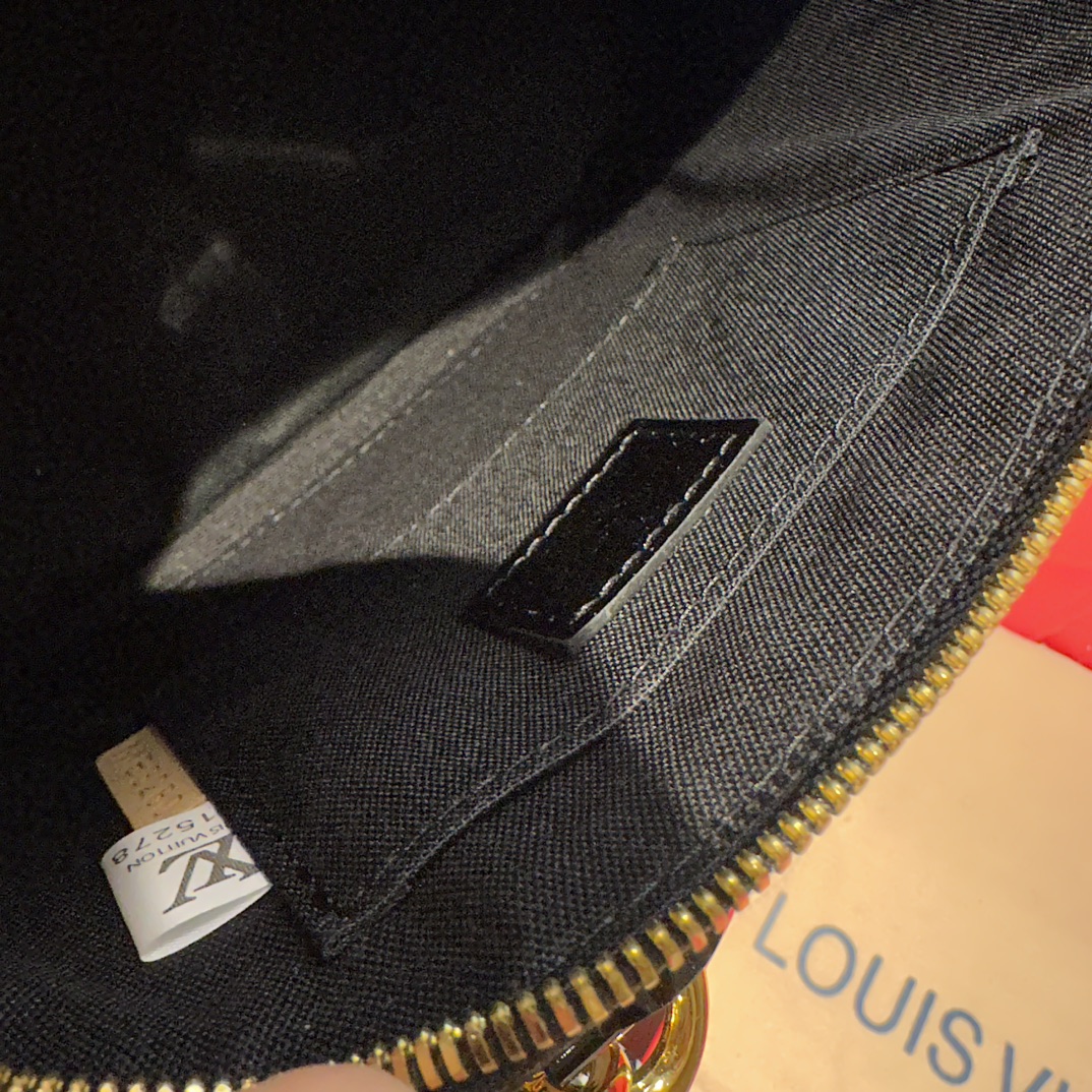 LV Alma Leather Shell Bag