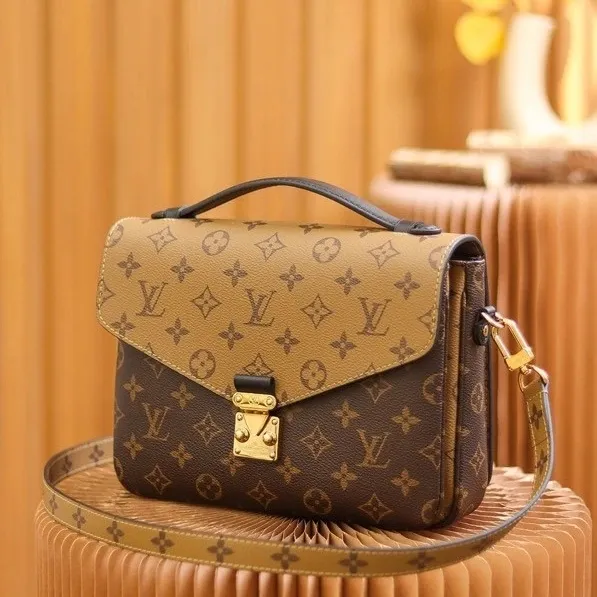 LV Monogram Leather Courier Bag