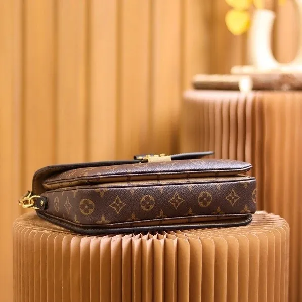 LV Monogram Leather Courier Bag