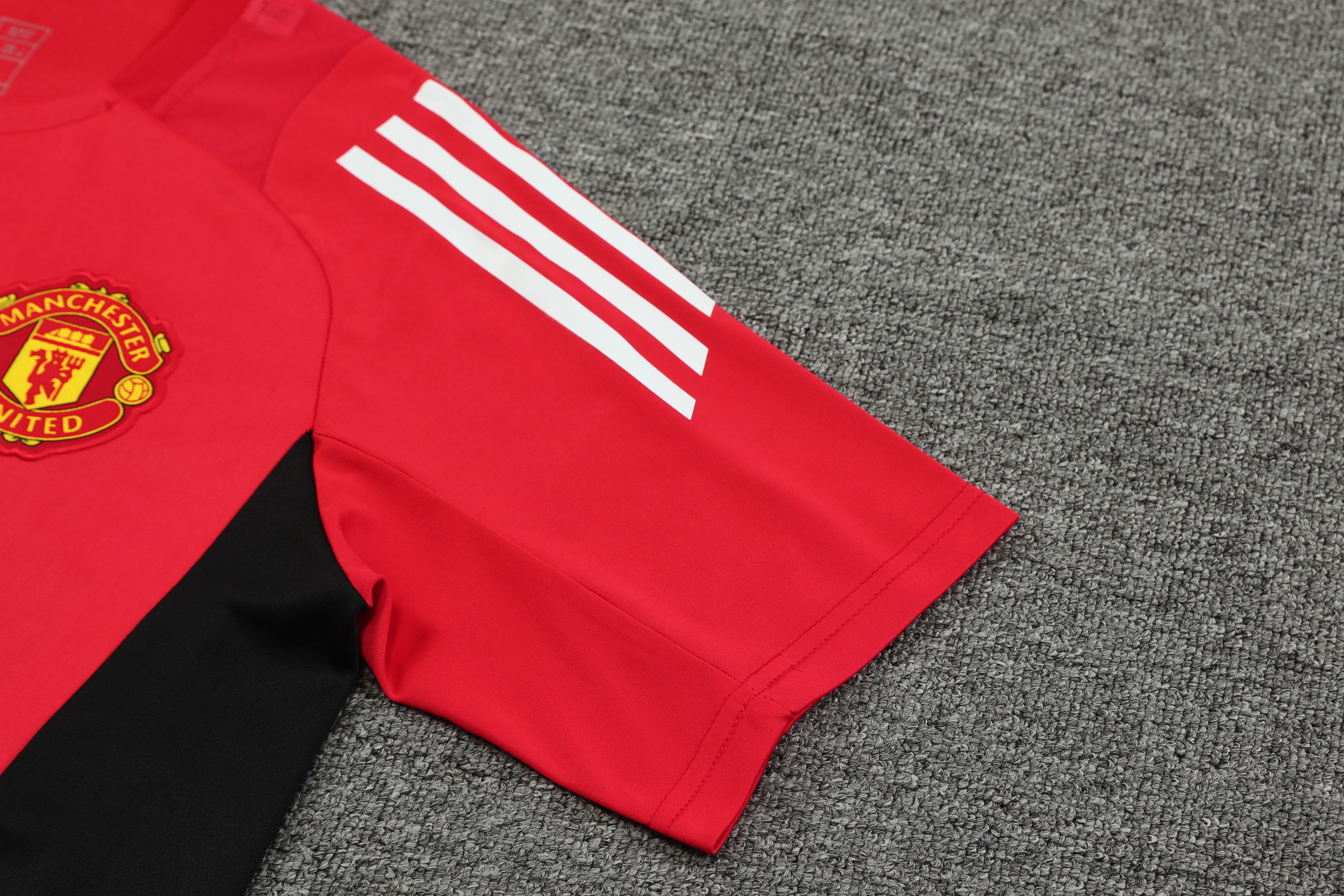 Manchester United 24-25 Short-Sleeve Training Kids Kit - Red Top and Black Shorts - UnitedFutballJersey
