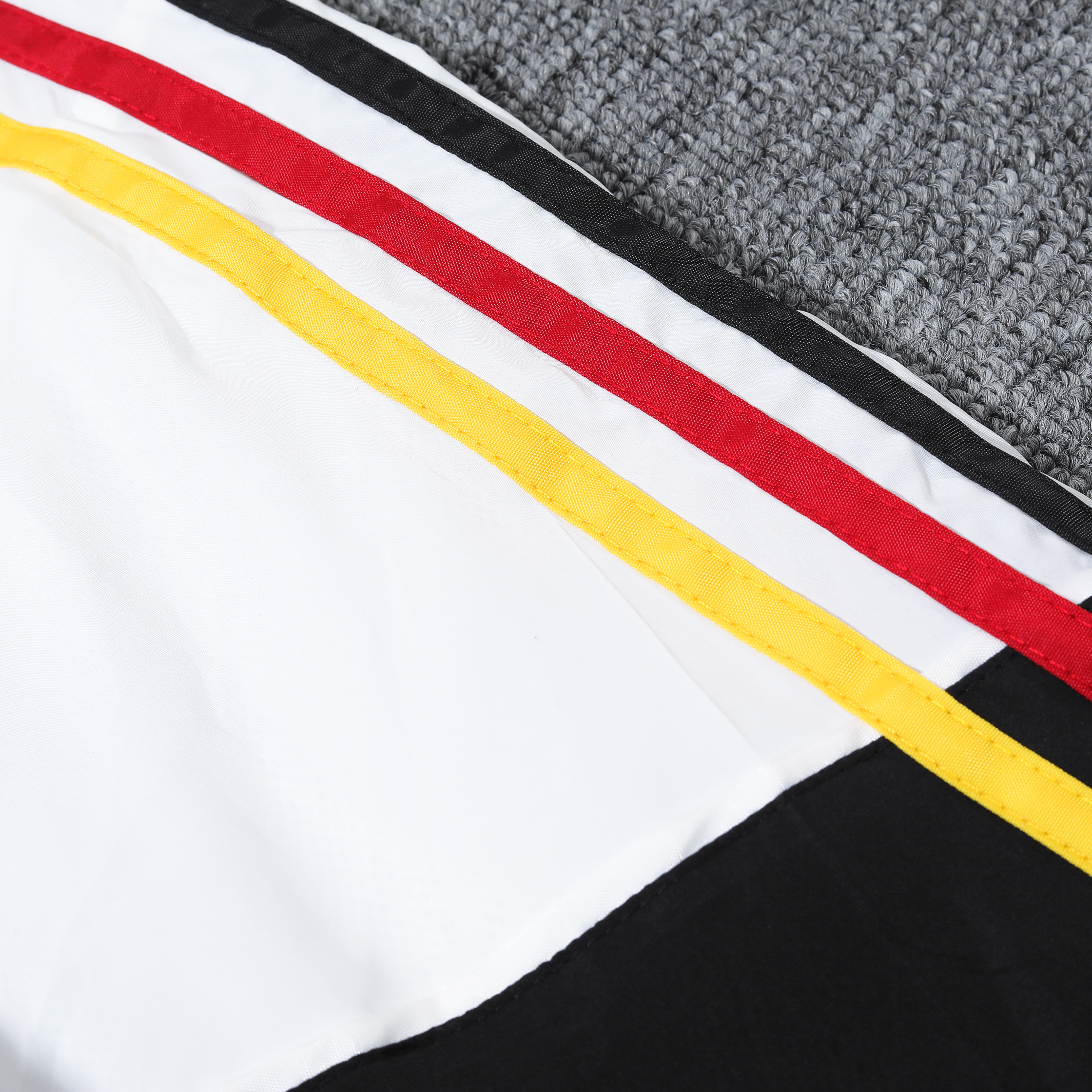 Germany 2024 National Flag Tricolor Hooded Windbreaker - Player Version - UnitedFutballJersey