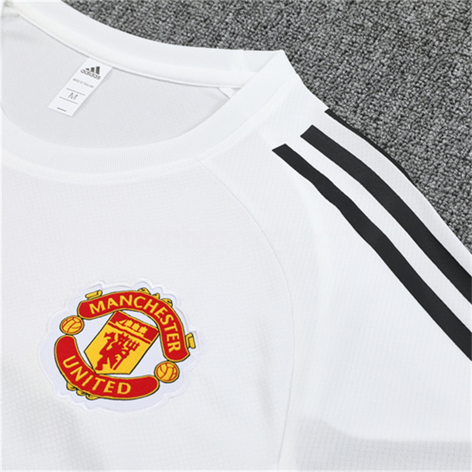 Manchester United 25-26 Kid Short-Sleeve Training Set - White Top & Black Shorts - UnitedFutballJersey