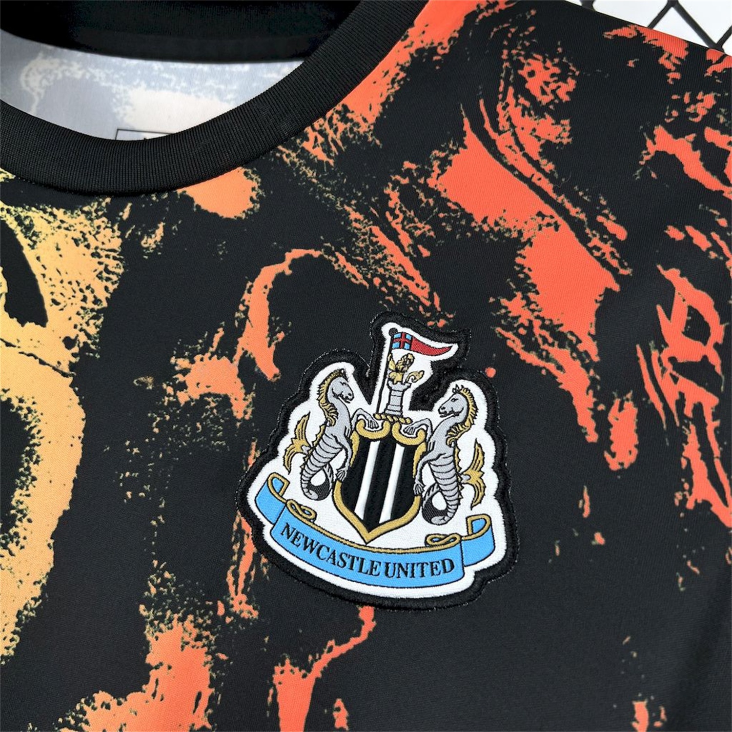 Newcastle United 25-26 Orange Red Graffiti Black Pre-Match Training Jersey - Fans Version - UnitedFutballJersey