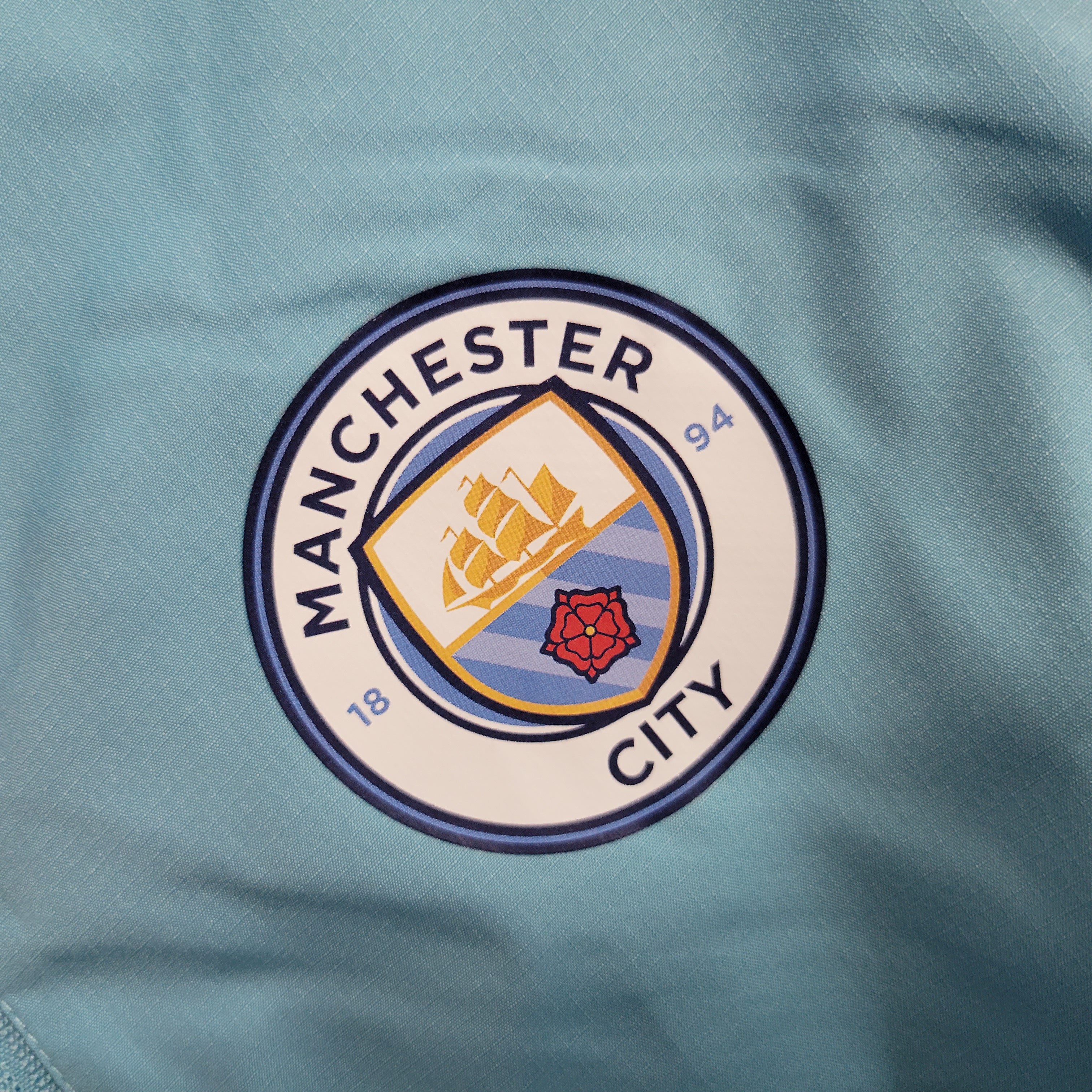 Manchester City 23-24 Windbreaker Light Blue - UnitedFutballJersey