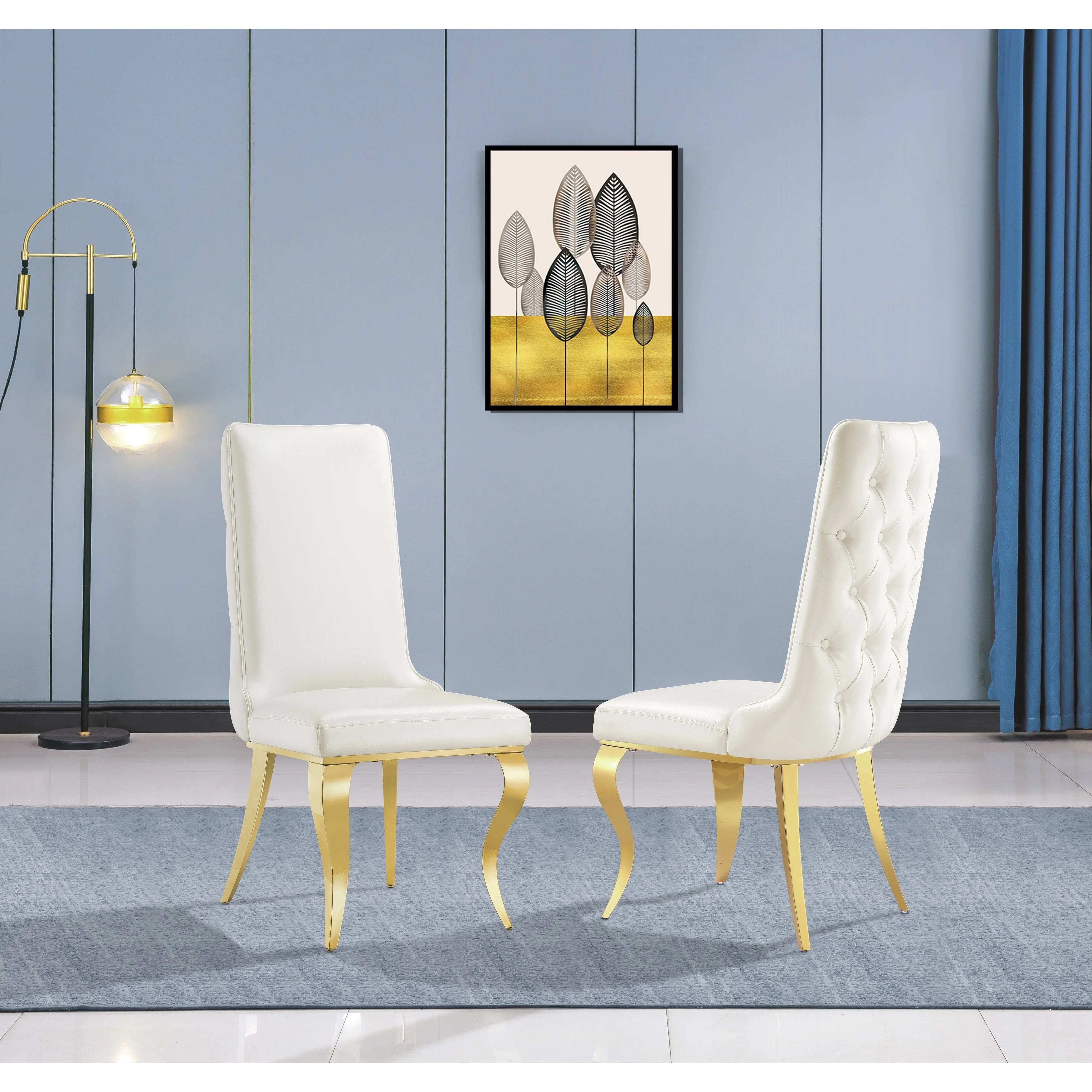 White leather dining chairs with gold legs