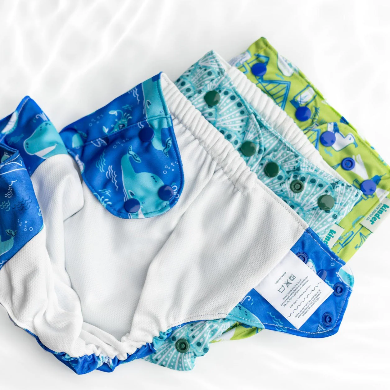 Kinder Cloth Diaper Co. Set of 3 Reusable Swim Diapers with Athletic Wicking Jersey (7-60lbs)