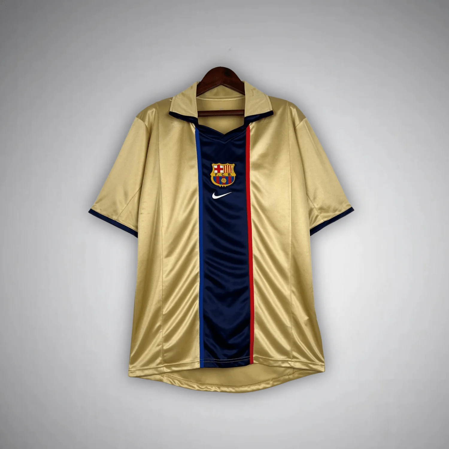 02/03-labelled gold Barcelona listing showing a closely related central navy and red-edged stripe design