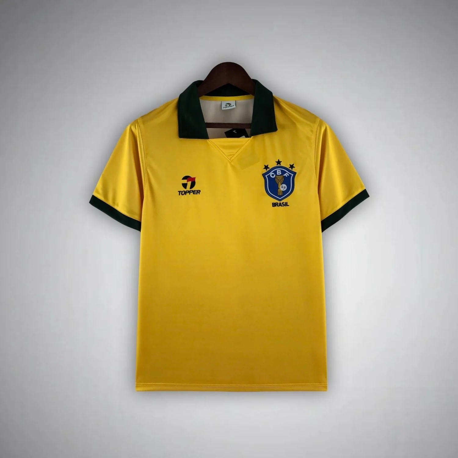 1986 Brazil home shirt with yellow body and green fold collar
