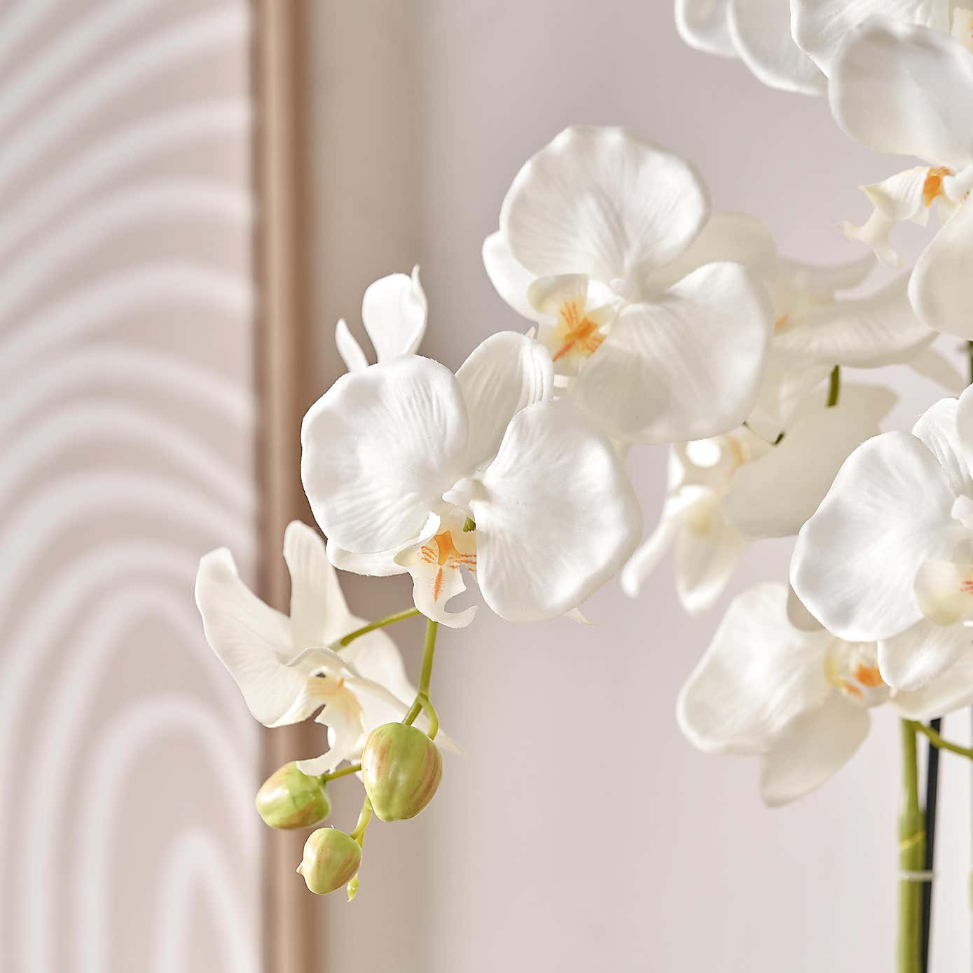 Artificial White Orchid in Rounded White Plant Pot
