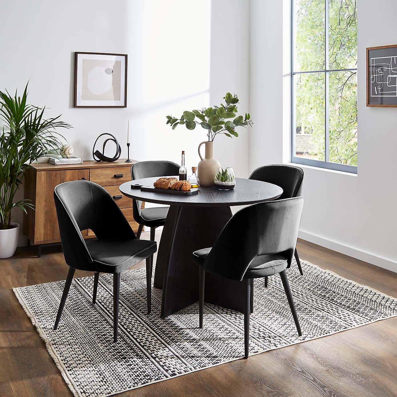 Effy Round Dining Table with 4 Lillia Black Velvet Dining Chairs