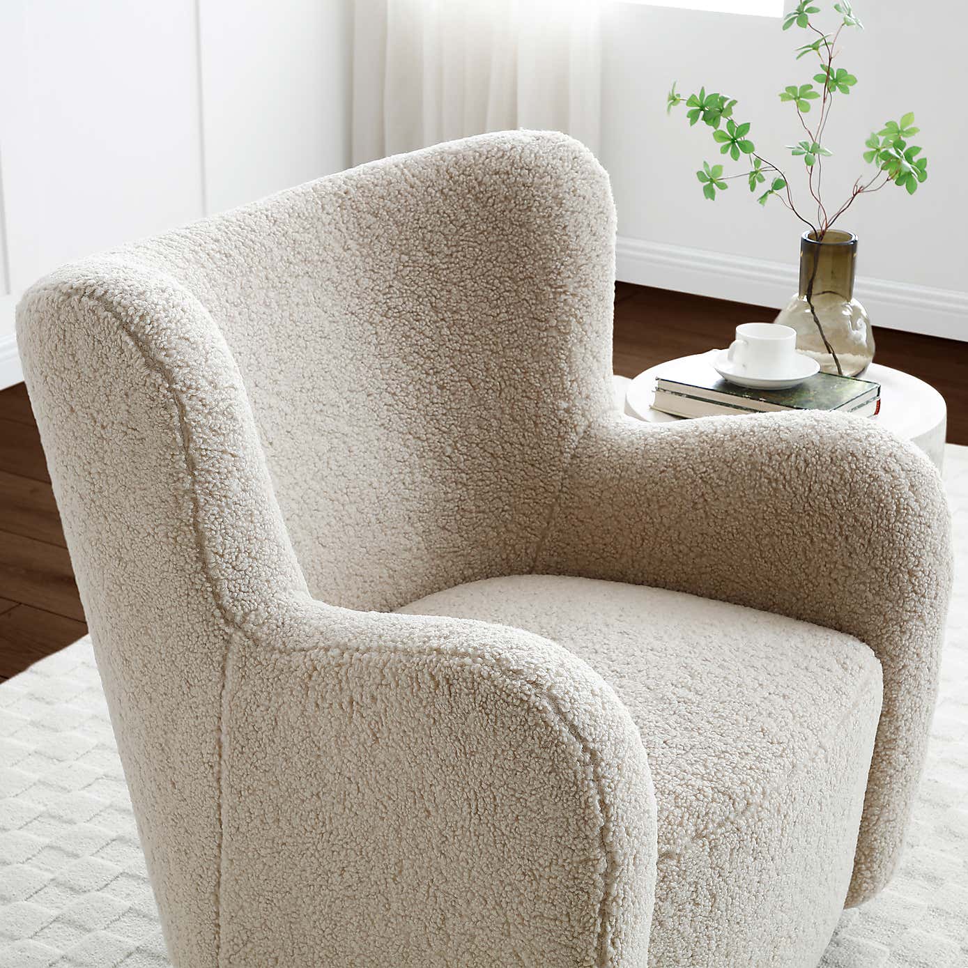 Theo Natural Borg Swivel Armchair