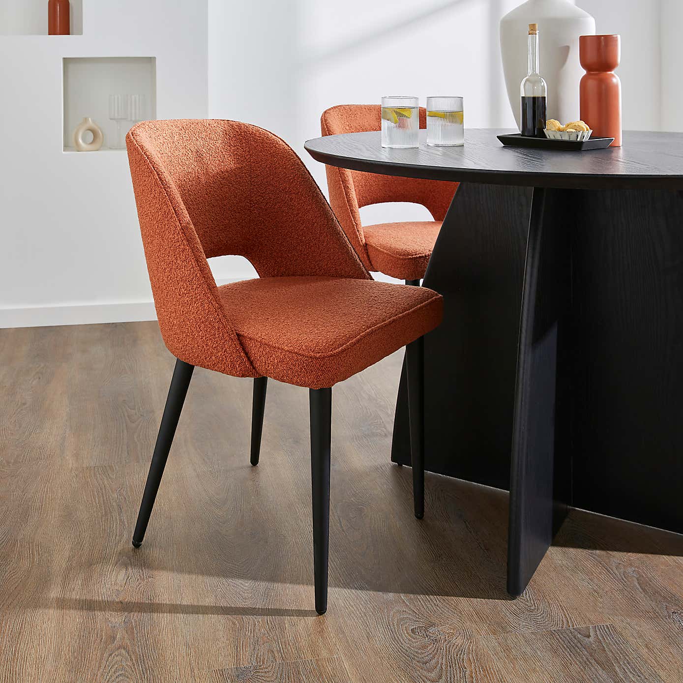 Effy Round Dining Table with 4 Lillia Orange Umber Boucle Dining Chairs