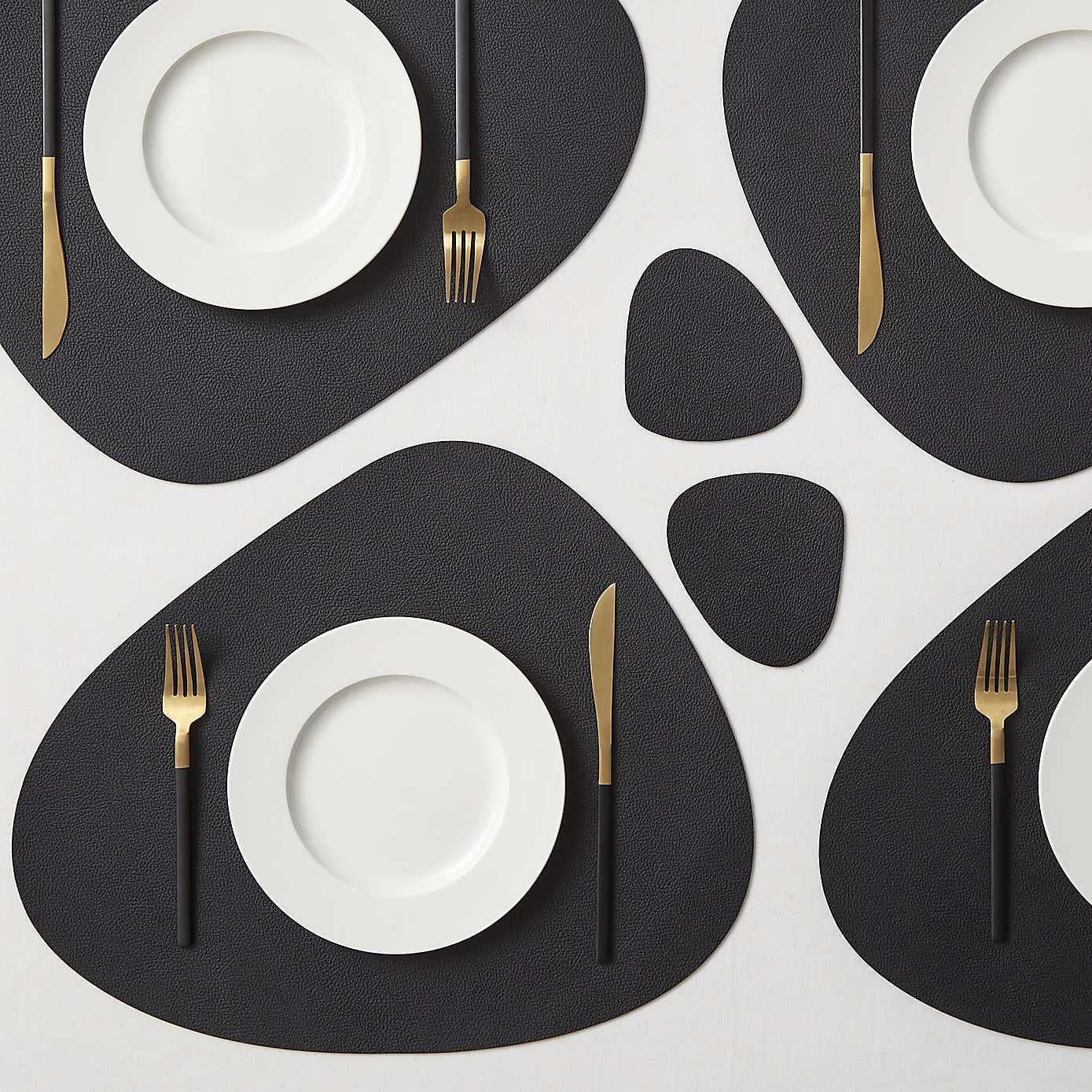 Pack of 4 Black Faux Leather Pebble Coasters