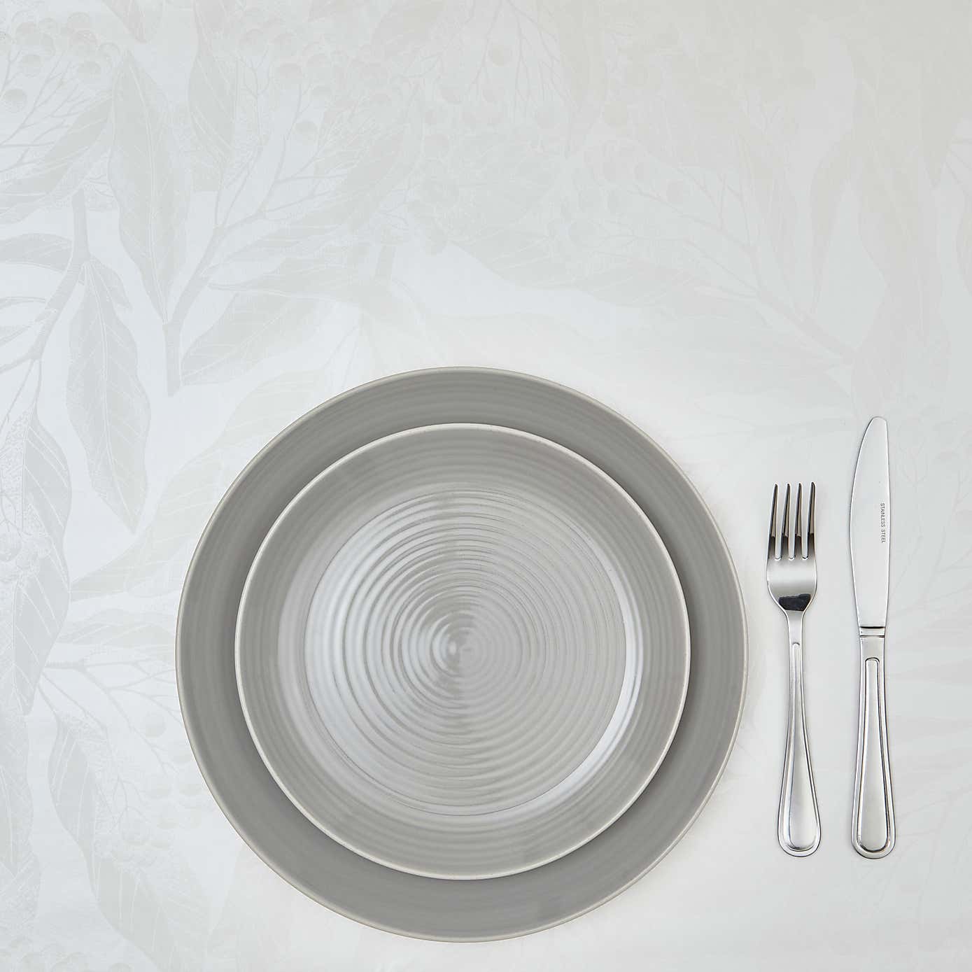 By the Metre Gaia White PVC