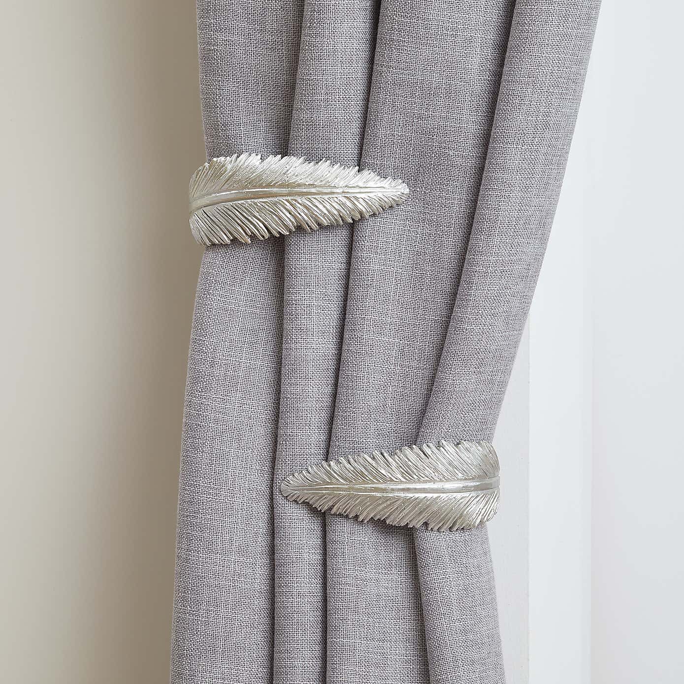 Mix and Match Feather Holdbacks