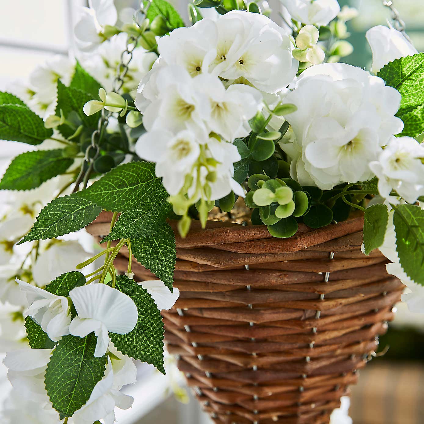 Artificial White Floral Brown Rattan Hanging Basket