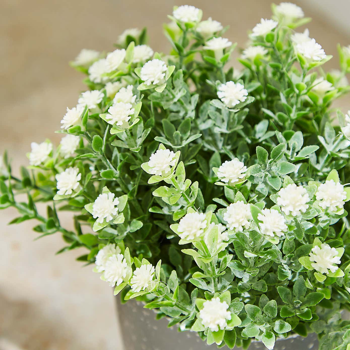 Artificial Flowers in Grey Plant Pot