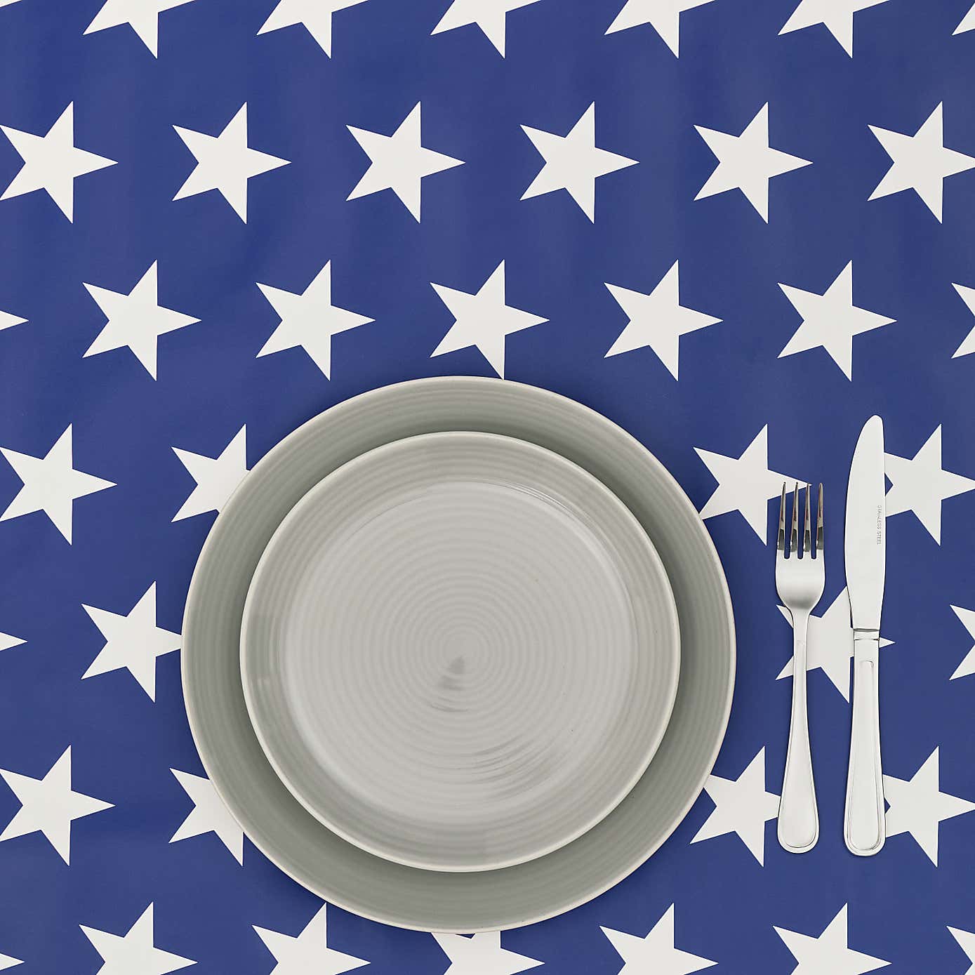 By the Metre Navy Stars PVC