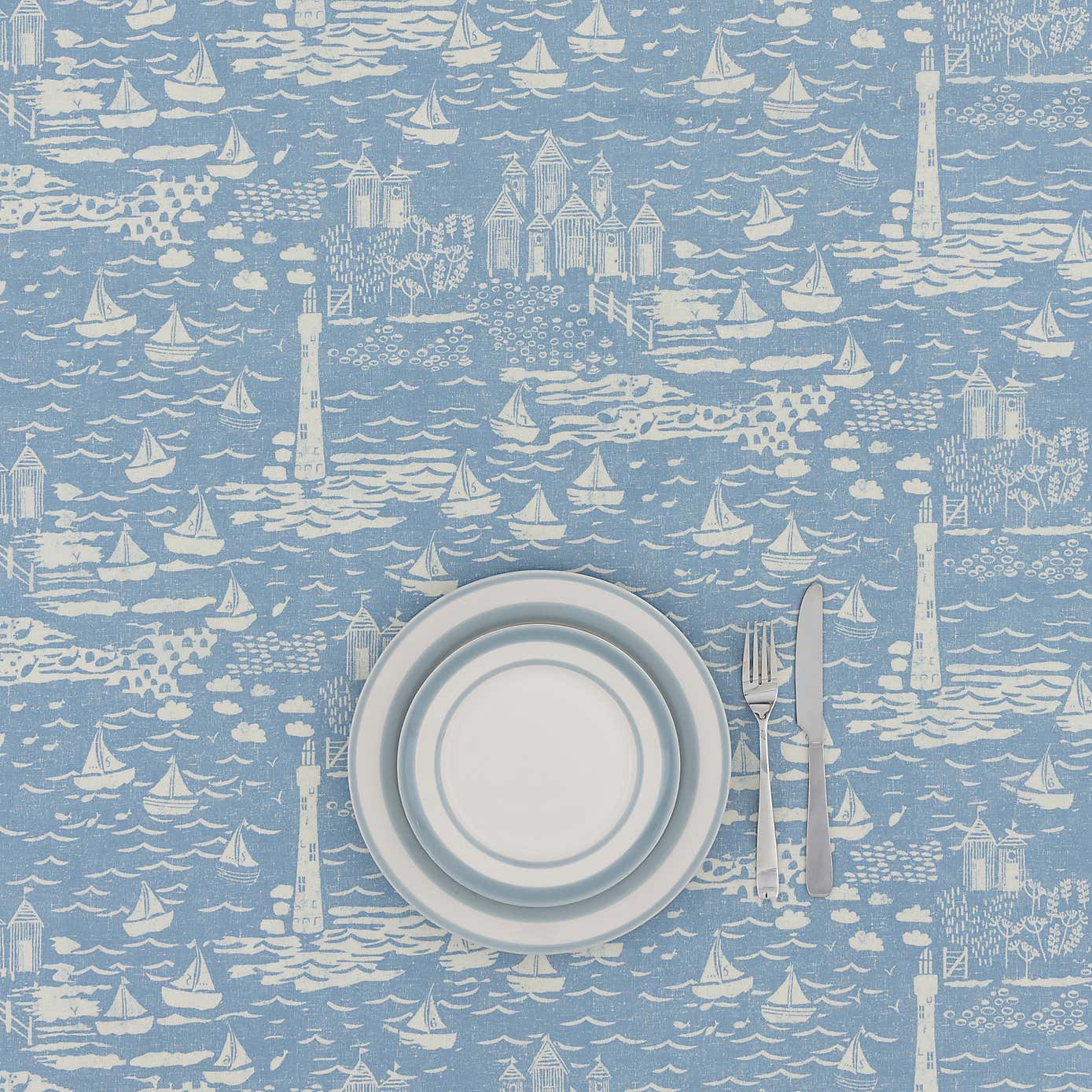 By the Metre Seaside Town PVC Ashley Blue