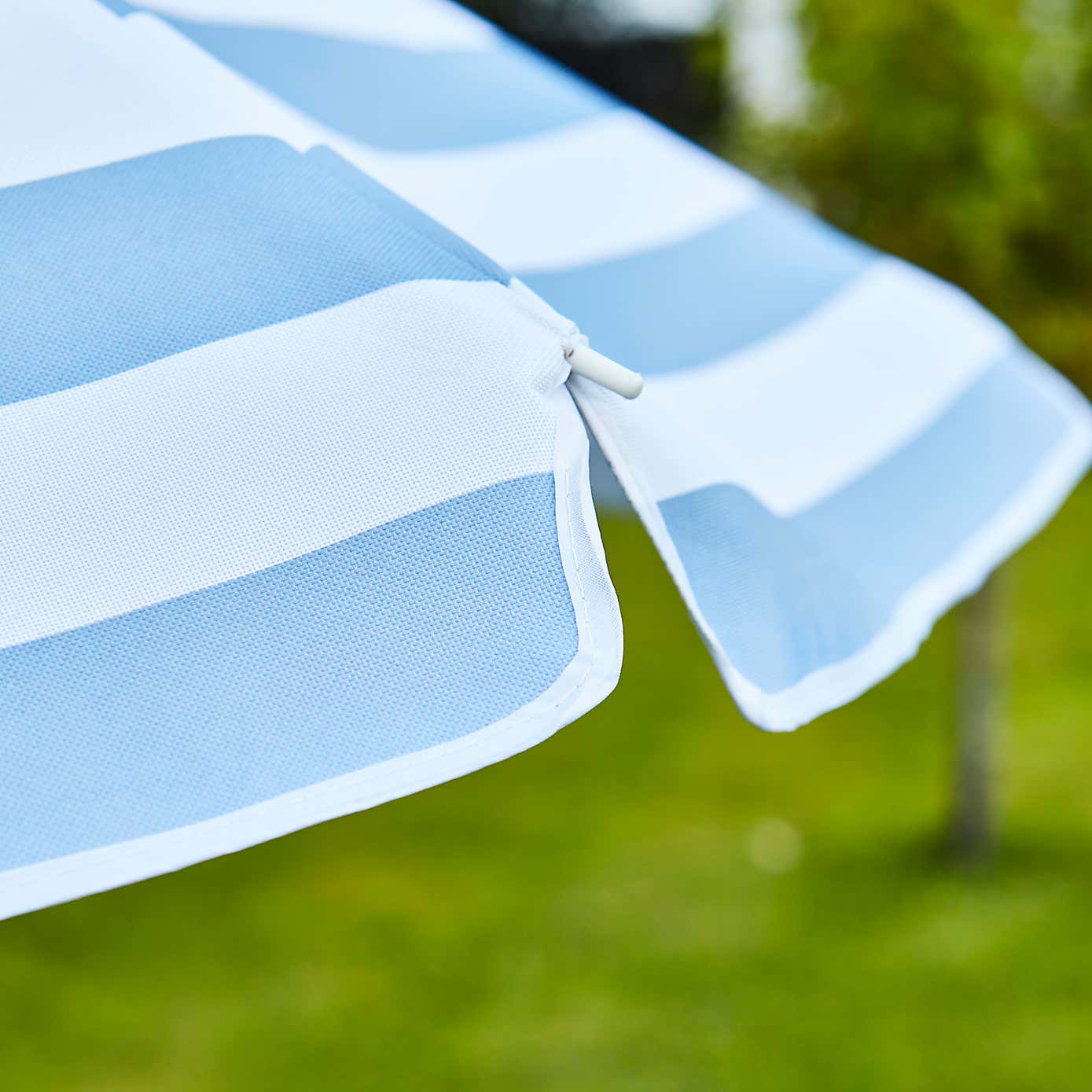 Blue and White Striped Beach Parasol