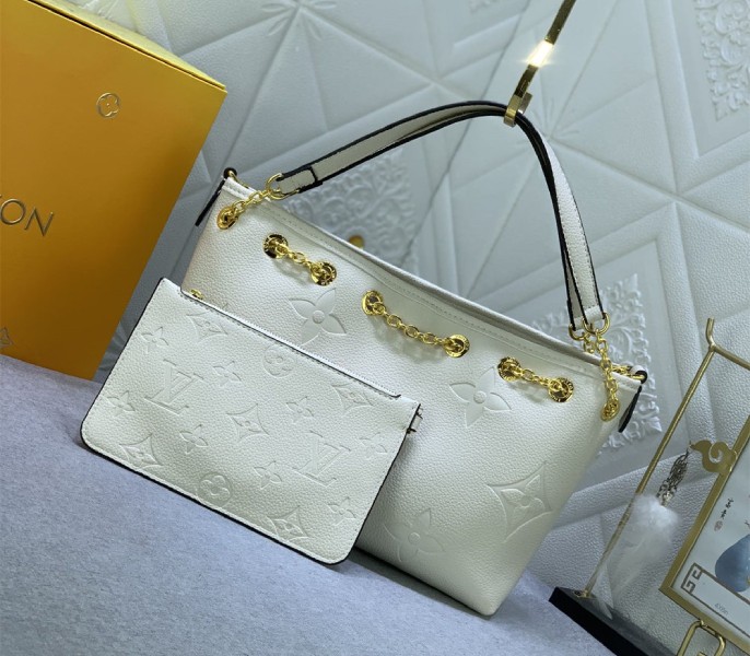 Louis Vuitton Monogram Empreinte Leather Bundle Bag In Cream