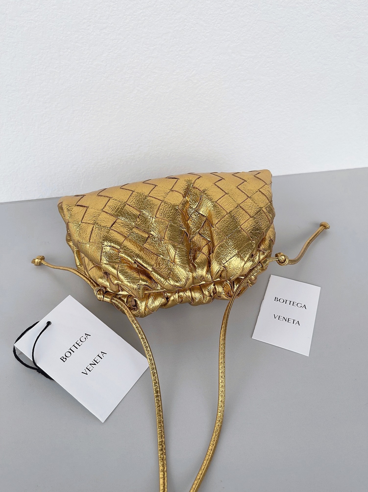 Knockoff Bottega Veneta Mini Pouch with Strap Gold