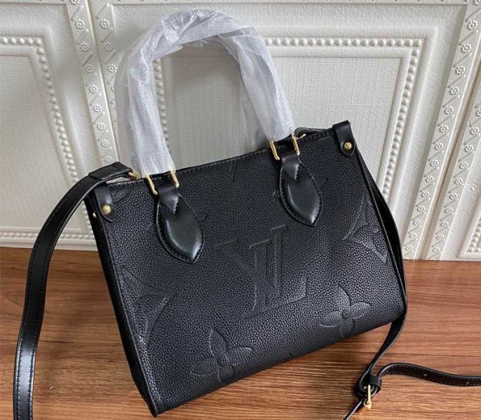 Louis Vuitton Monogram Empreinte Leather Onthego PM Bag In Black