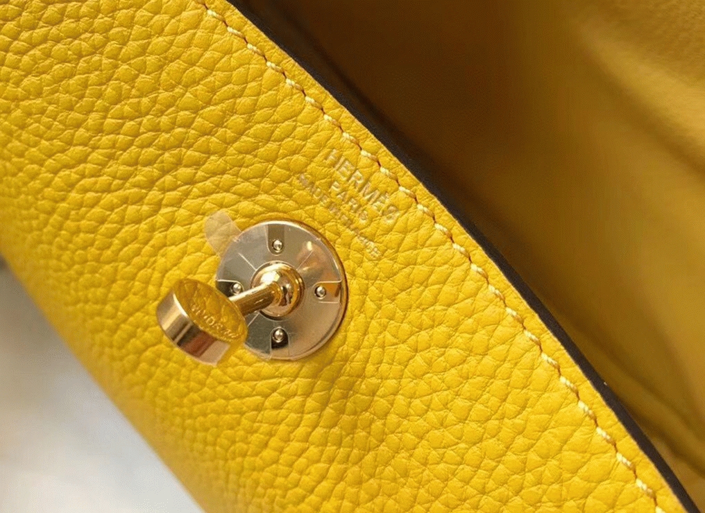 Fake luxury Hermes Lindy Mini handbag in yellow clemence leather