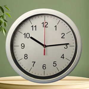 White Round Quartz Wall Clock Battery Operated 24cm Minimalistic - White by basiks