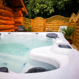 Two Night Stay in a Log Cabin at Badgers Wood, Hoo Zoo and Dinosaur World - Red by Find Me A Gift