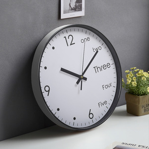 Round Clock with Arabic English Numerals - Black and White by Livingandhome